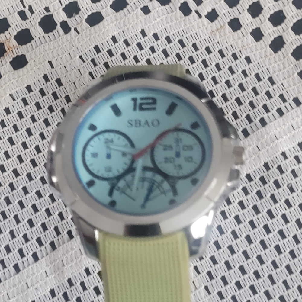 Silver and Green Women's Watch